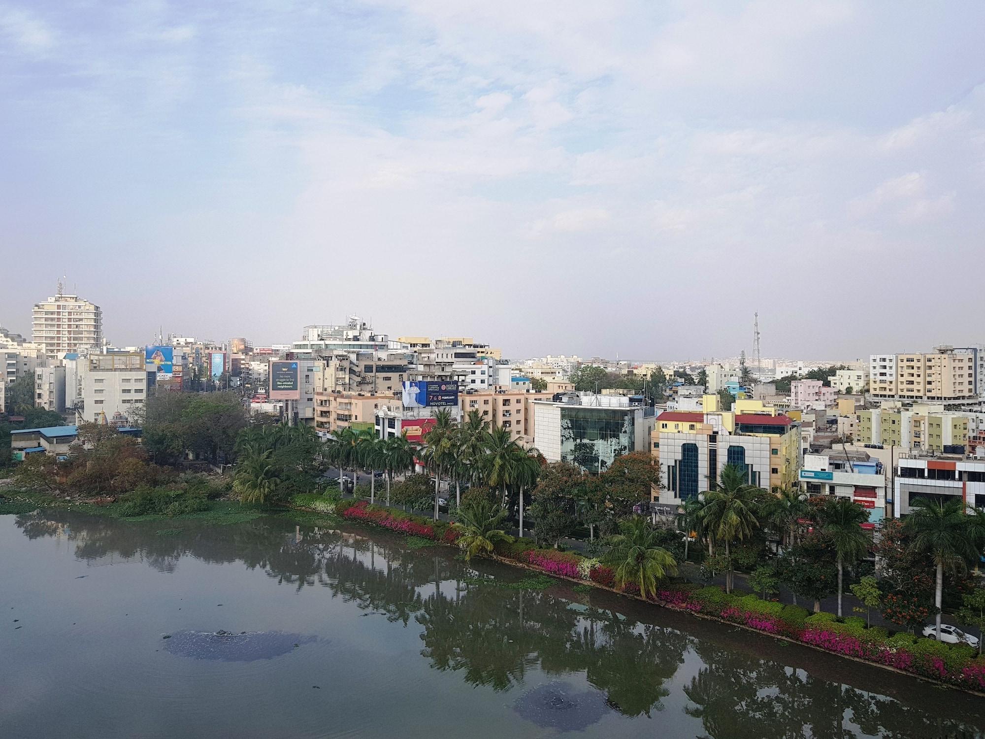 Taj Banjara Hotel Hyderabad Exterior photo View of the city from the lake